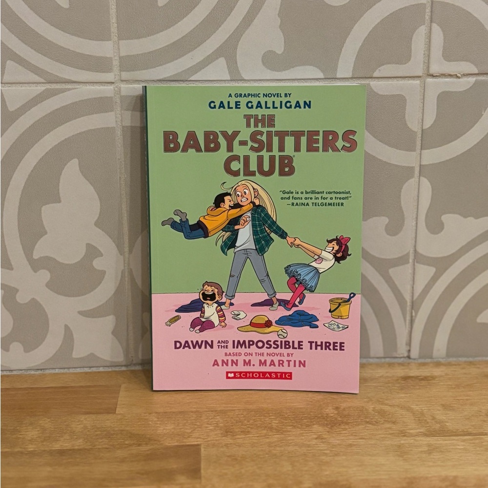 Scholastic Graphic Novel with Pink and Green Cover